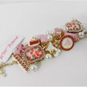 Betsey Johnson Gold tone baby cakes baking charm bracelet